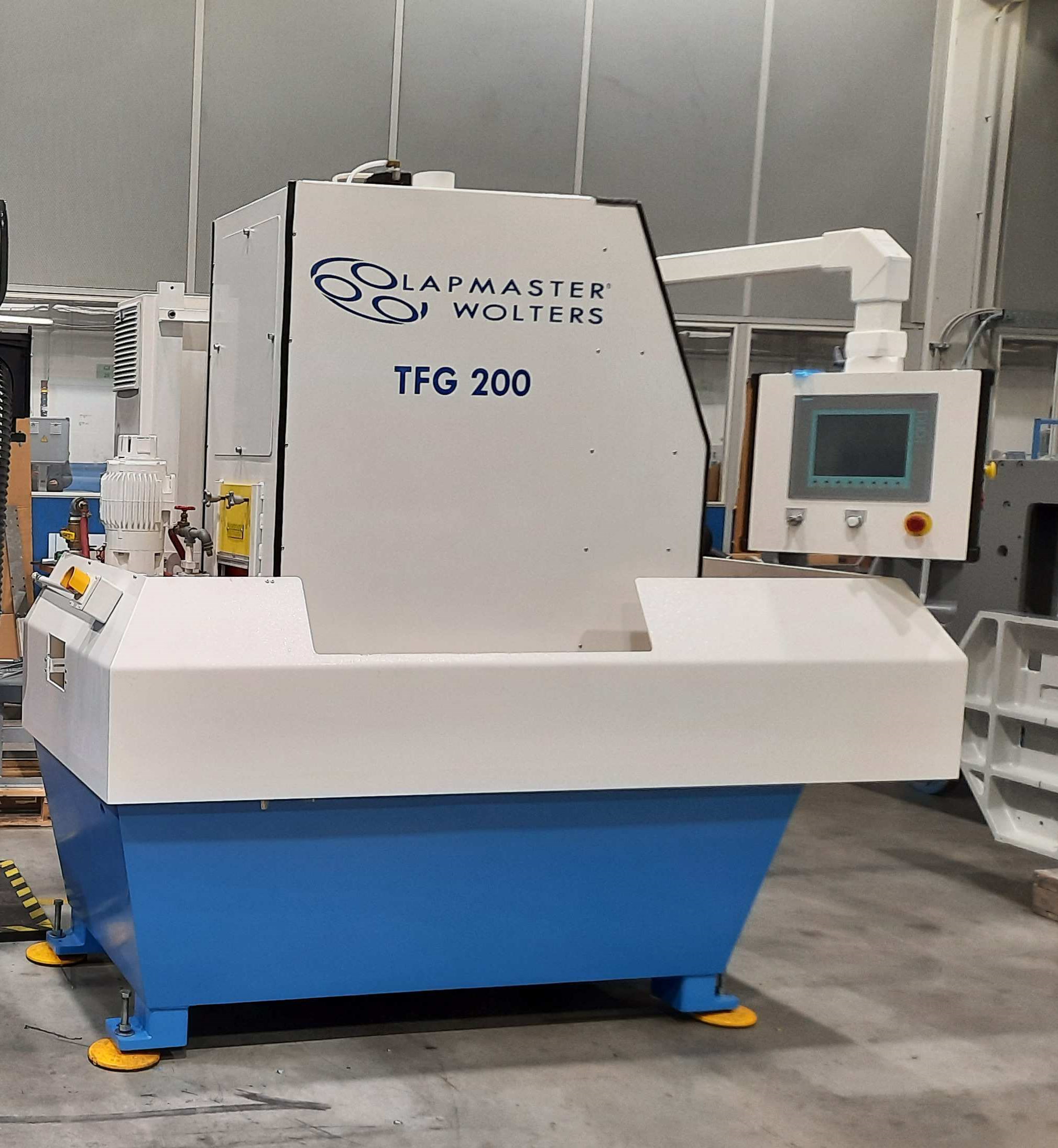 Lapmaster Wolters 829TFG Thru-Feed Grinding Machine